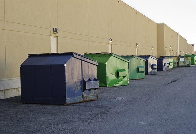 construction waste bins waiting to be picked up by a waste management company in Clifton Springs